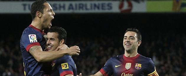 Adriano celebrates his goal with Pedro and Xavi