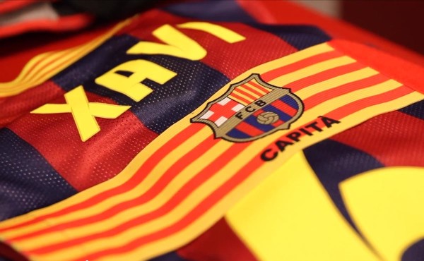 Xavi jersey and captain armband in FC Barcelona locker room before a match at the Camp Nou