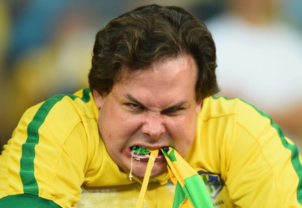 a very angry Brazilian fan at the World Cup 2014