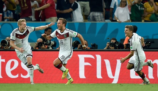 Mario Gótze and Schürrle celebrate the only goal at the 2014 World Cup final against Argentina