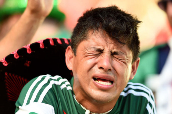 A sad Mexican fan at the 2014 World Cup in Brazil