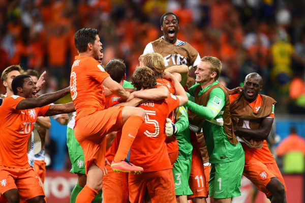 Dutch team celebrate penalty win against Costa Rica